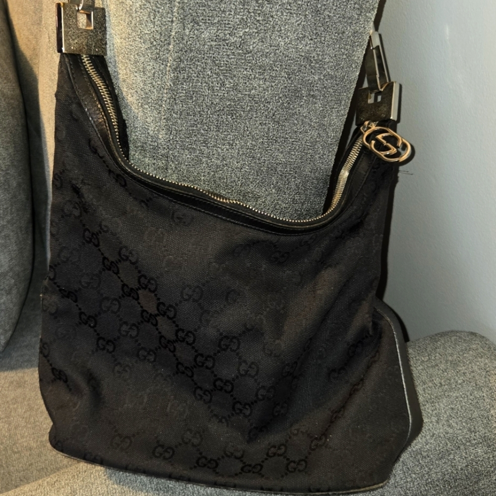 Authentic Gucci GG monogram leather trim bucket shoulder bag